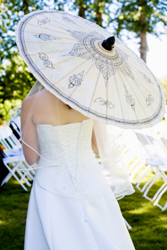 bride with wedding parasol